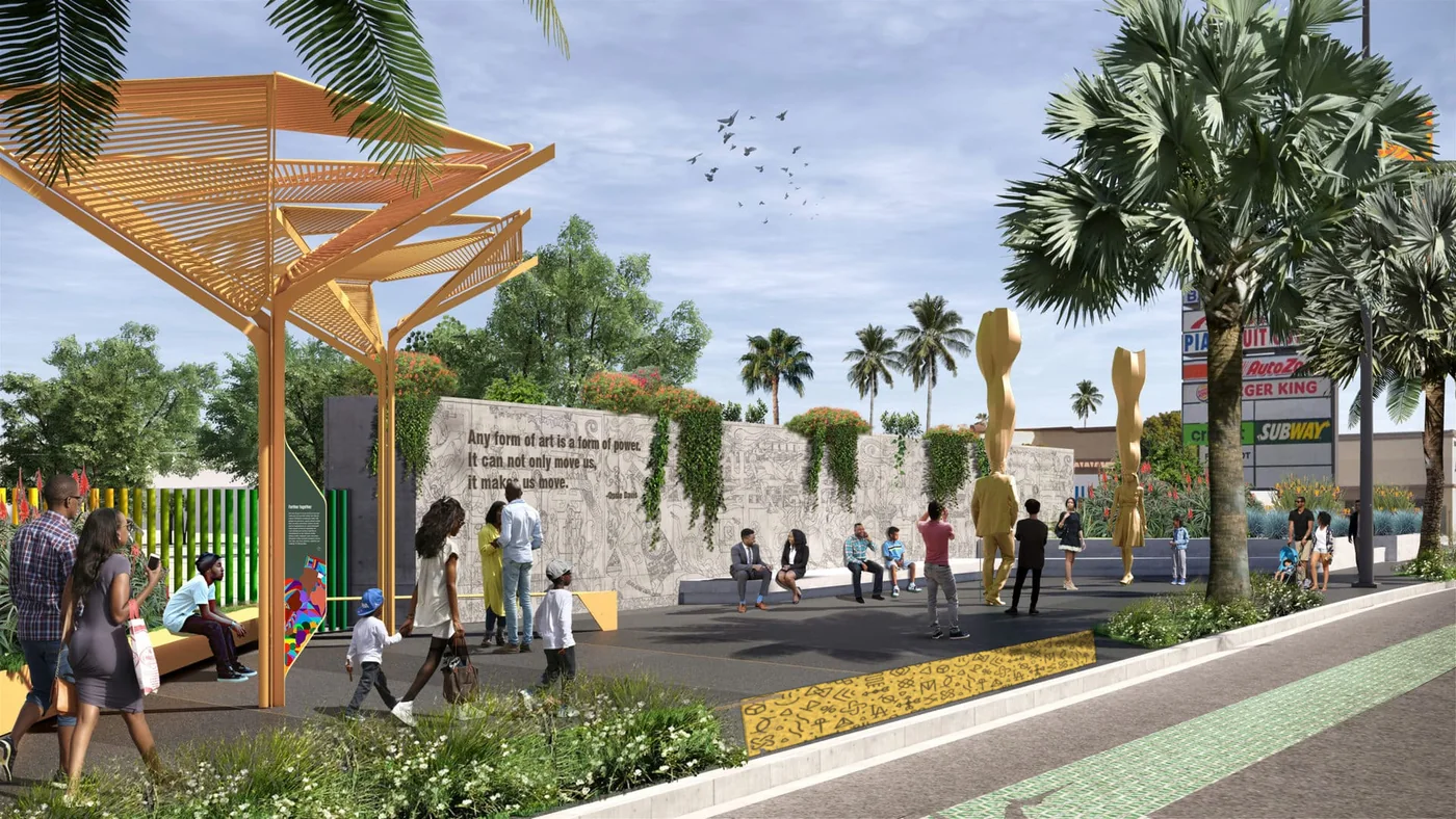 Rendering of a pocket-park plaza beside Crenshaw Boulevard, with a yellow paver of community glyphs set into the ground in front of a carved wall