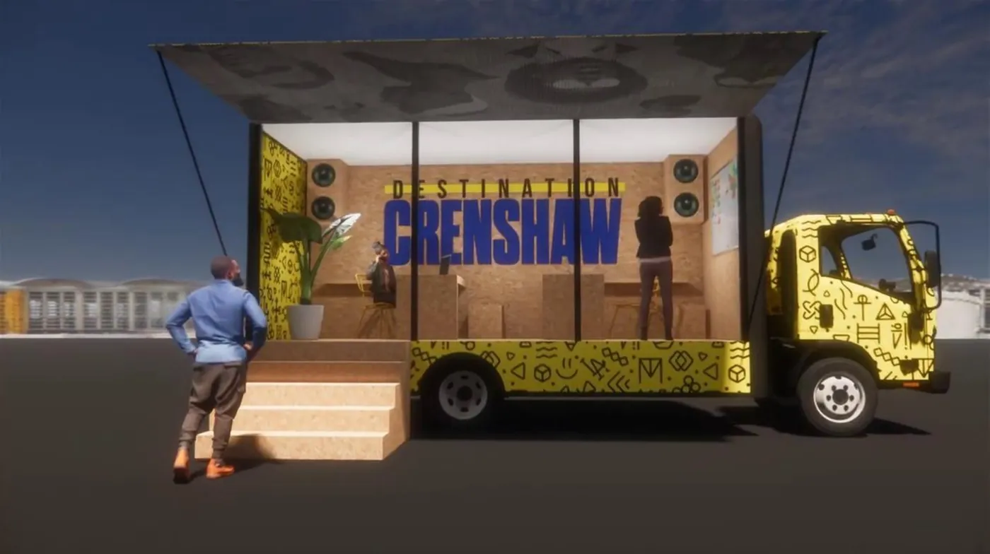 The general-purpose truck with a yellow glyph wrap and an open stage